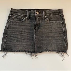 Levi’s size 24” black denim mini shirt